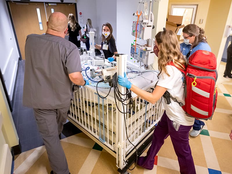 In moves that have been rehearsed for months, medical teams escorted patients from the Batson PICU to the pediatric intensive care floor at the Kathy and Joe Sanderson Tower.